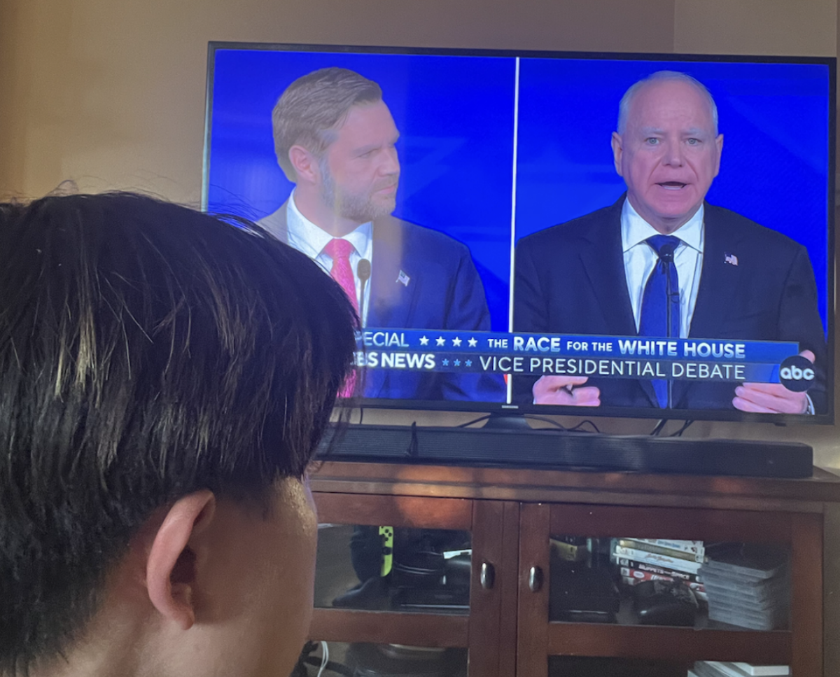 Jonah Lei ‘25 watches the Vice Presidential debate between Senator JD Vance and Governor Tim Walz